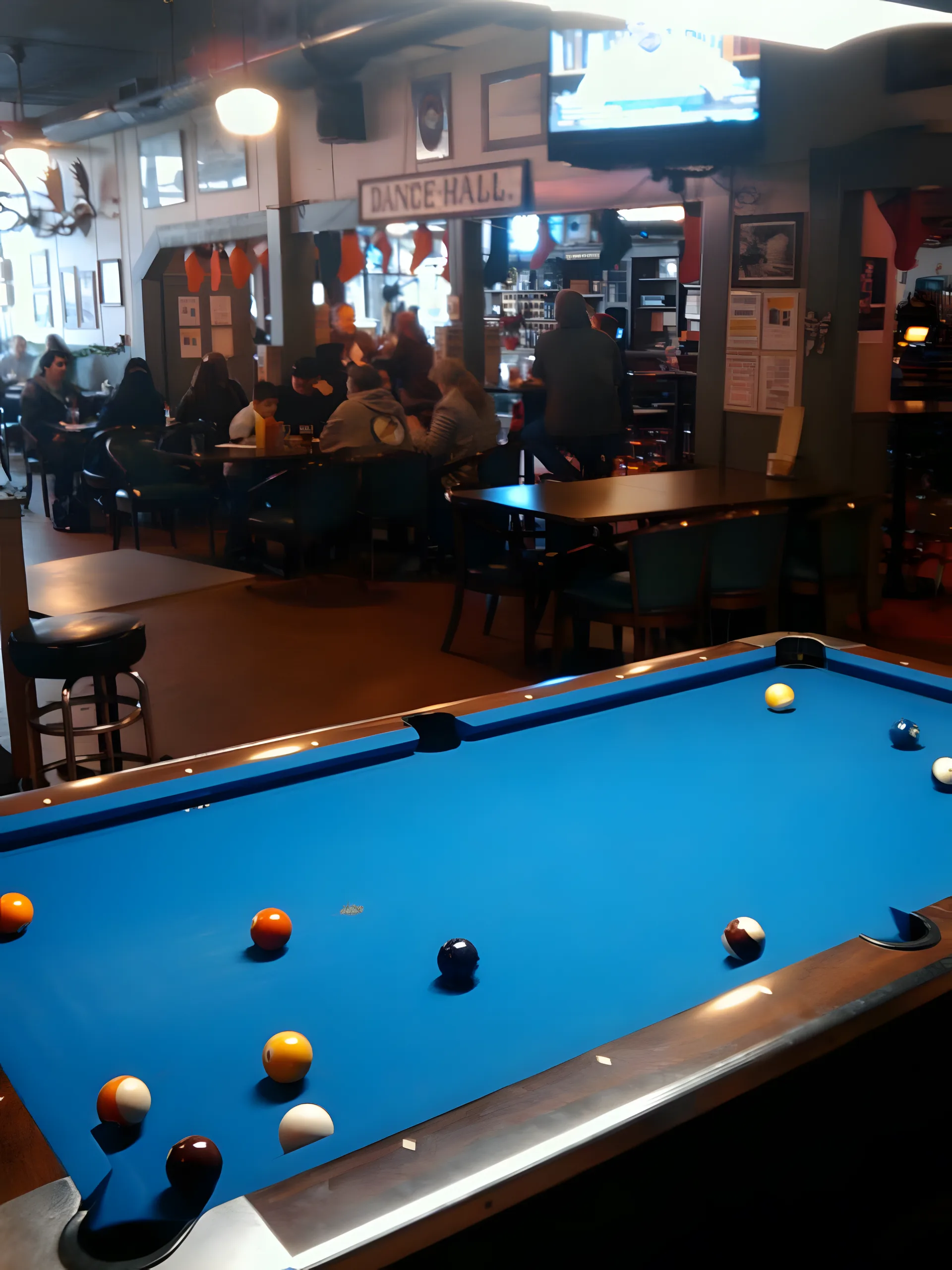 Mac's Place bar interior with hand-carved back bar
